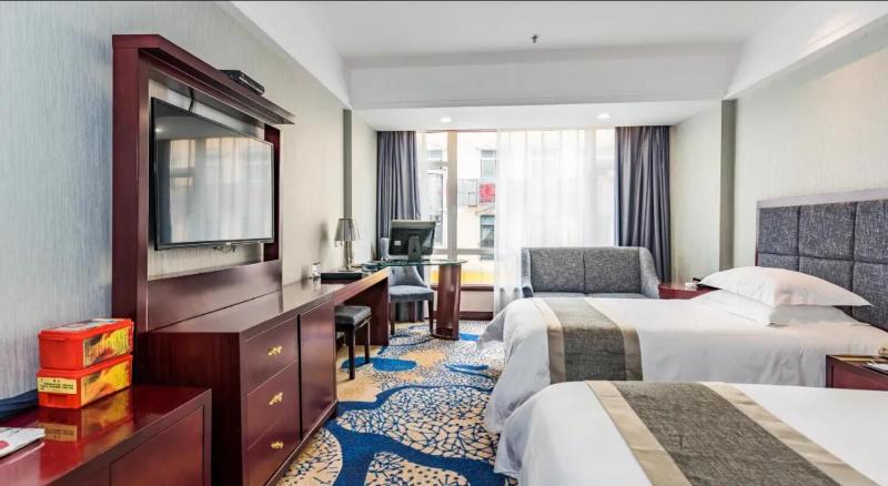 فندق Enshi International