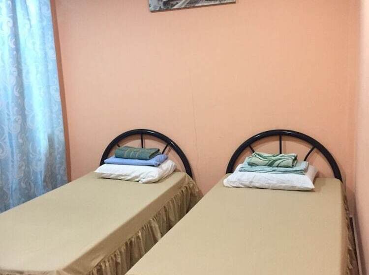 فندق Oyo Home 90352 Muan's Homestay