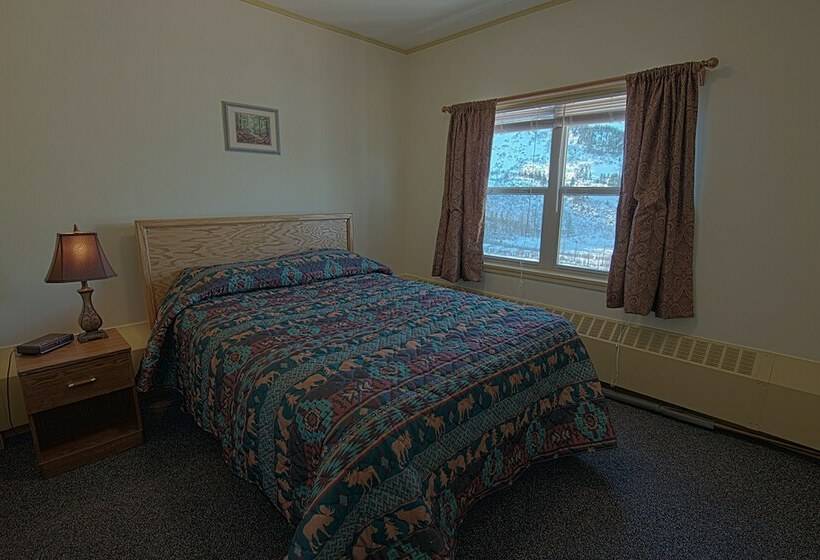 Отель Glacier View Condo Suites