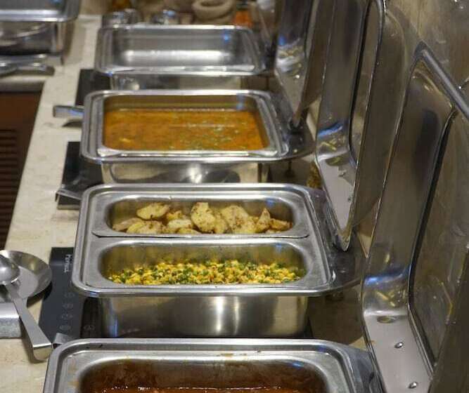 בית מלון כפרי Ambrosia Sarovar Portico