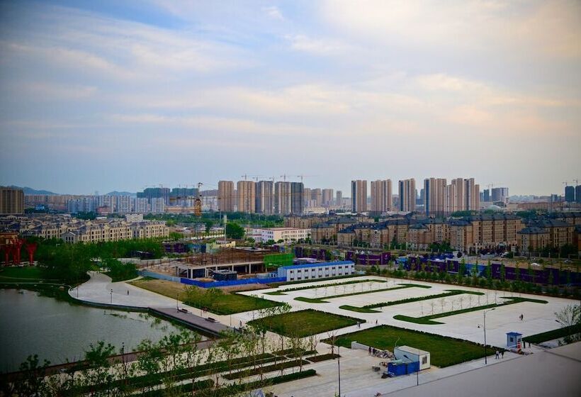 Отель Sheraton Qingdao Licang