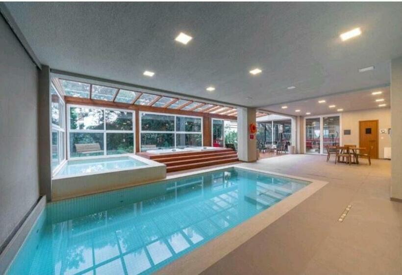 Отель Flat Laghetto Stilo Borges