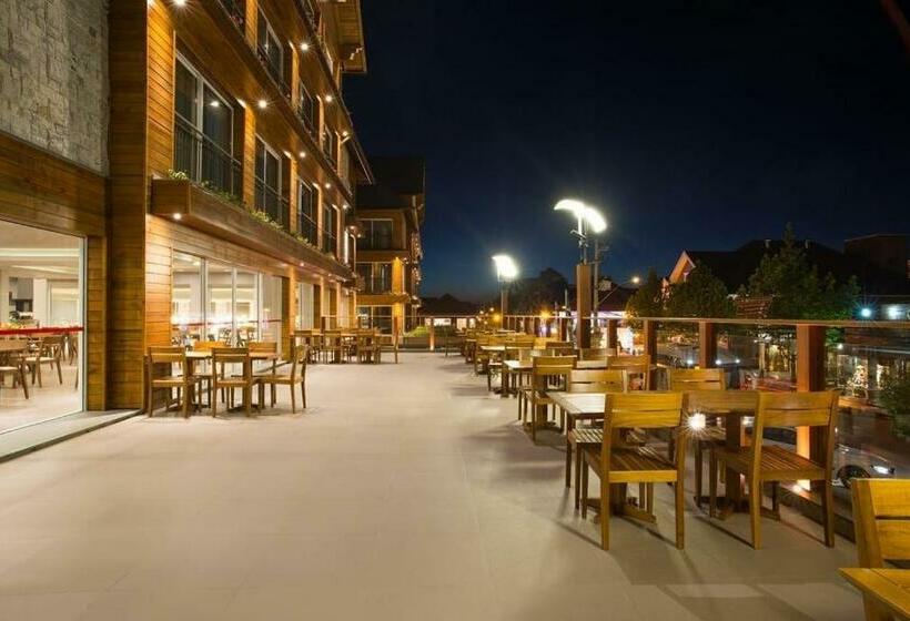 Отель Flat Laghetto Stilo Borges