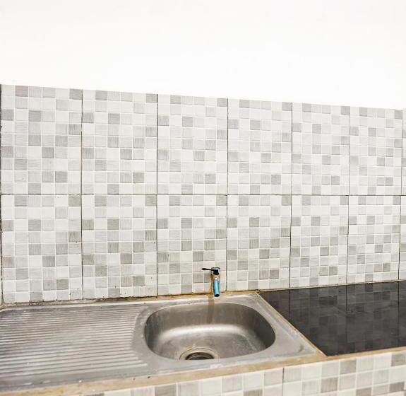 호텔 Tutus Homestay Syariah Redpartner