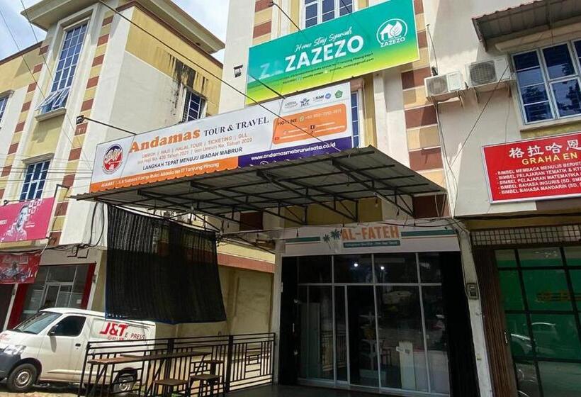 호텔 Zazezo Homestay Syariah Redpartner