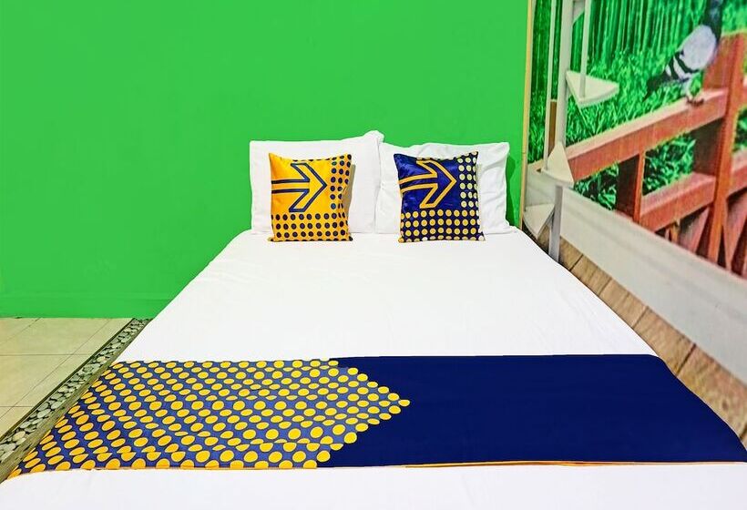ホテル Spot On 91697 Nyaman Homestay Syariah