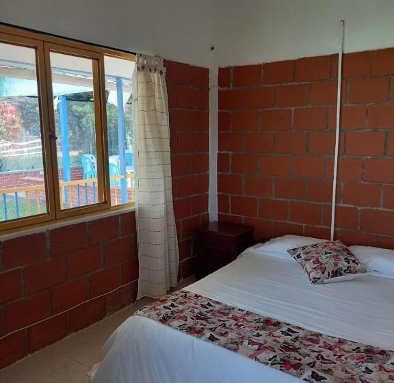 פנסיון La Rivera Hosteria Campestre