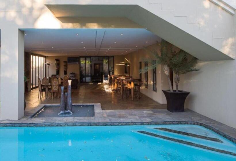 פנסיון Lazy Lizard Guesthouse