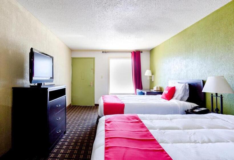 בית מלון כפרי Palm Court Inn & Suites