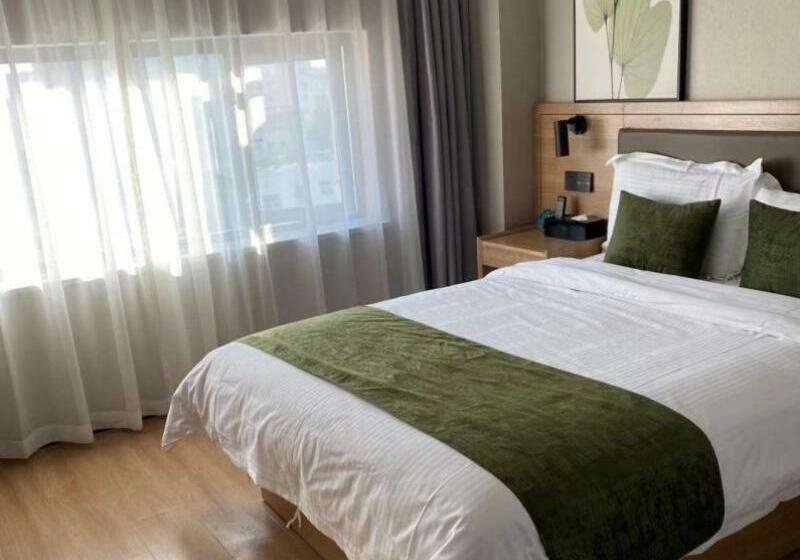 Отель Green Tree Inn Express Suzhou Zhangjiagang Free Trade Zone Central Plaza