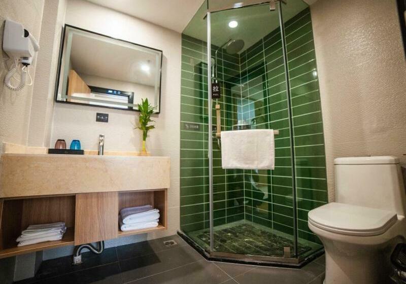 Отель Green Tree Inn Express Suzhou Zhangjiagang Free Trade Zone Central Plaza