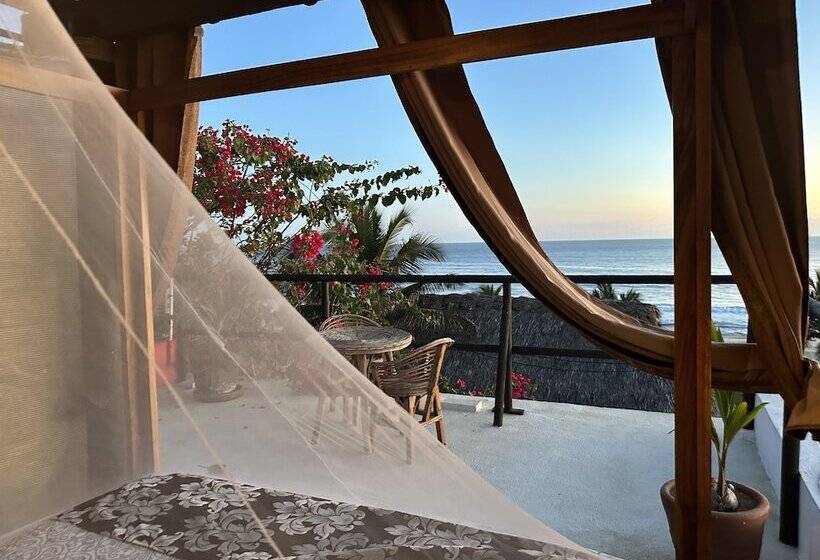 مبيت وإفطار Beachfront Paradise Boutique