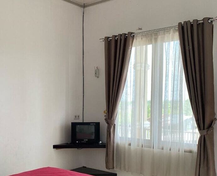 호텔 Oyo 90960 Putih Salju Homestay Syariah