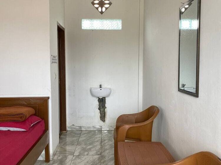 호텔 Oyo 90960 Putih Salju Homestay Syariah