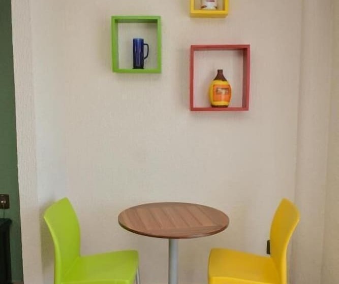 Отель Suites Los Arcos