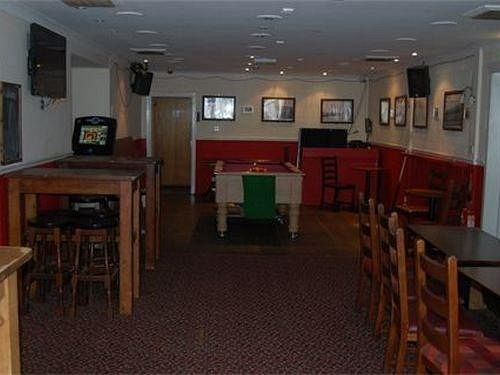 Отель Mackenzies Highland Inn