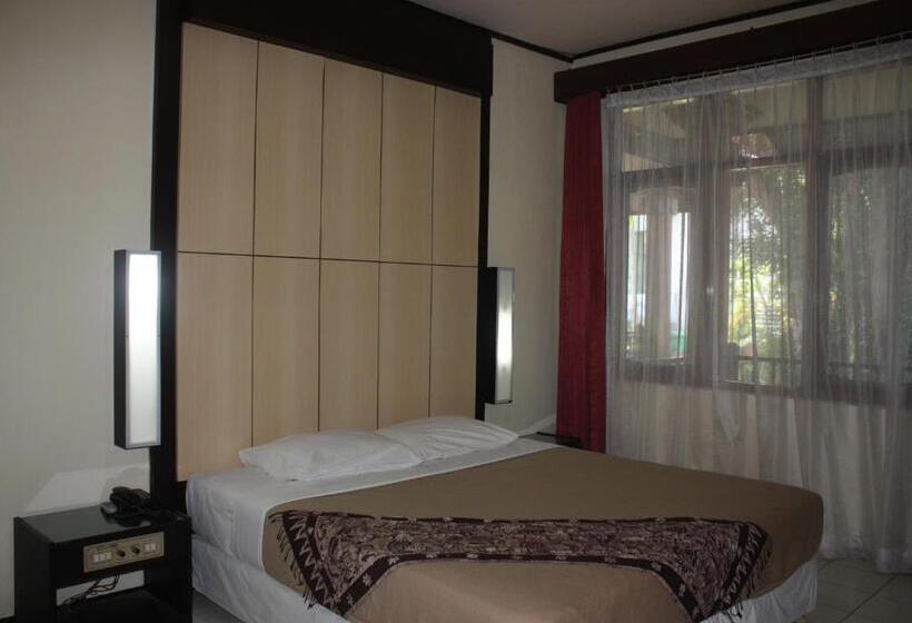 酒店 Puri Naga Beachfront Cottages