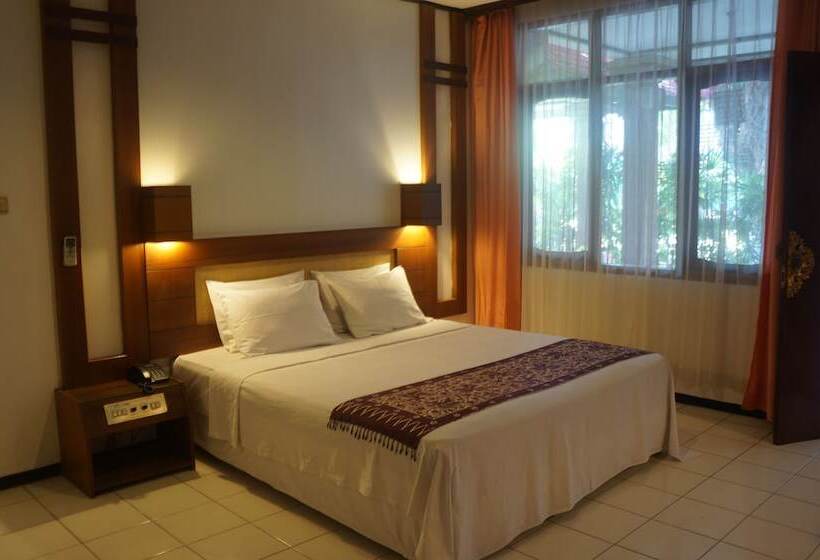 酒店 Puri Naga Beachfront Cottages