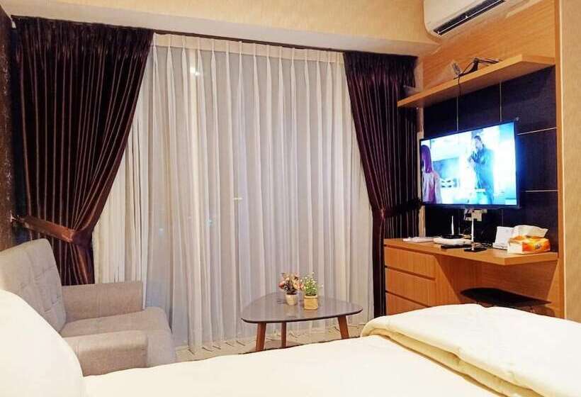 Отель Apartemen Grand Kamala Lagoon By Aparian