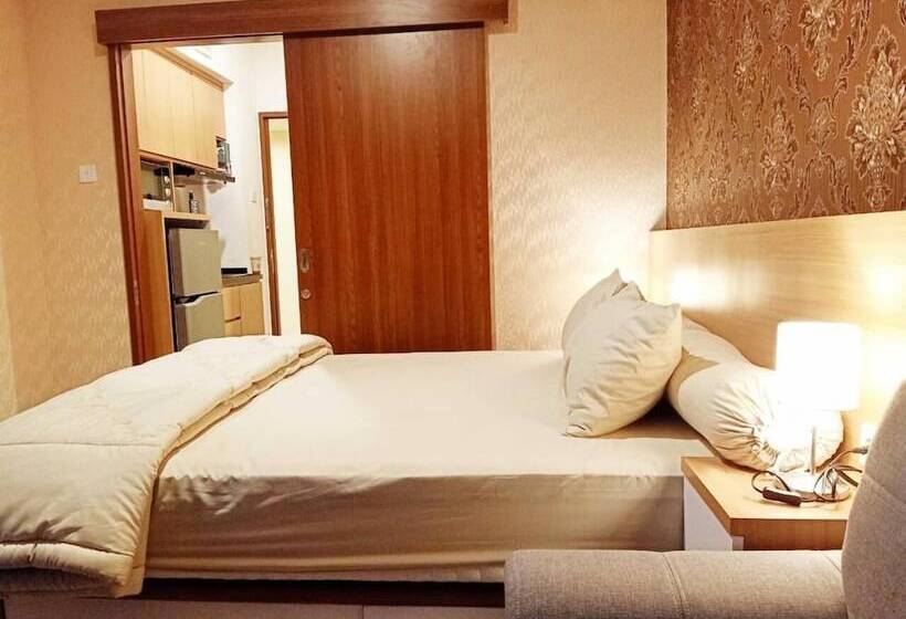 Отель Apartemen Grand Kamala Lagoon By Aparian