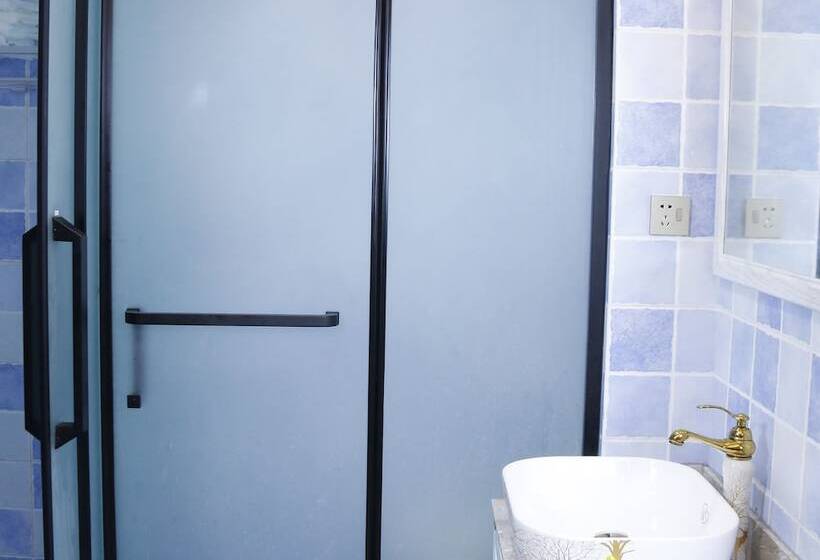 Отель Shenzhen Sea House Apartment