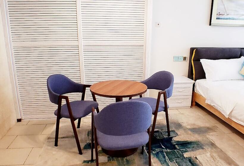 Отель Shenzhen Sea House Apartment