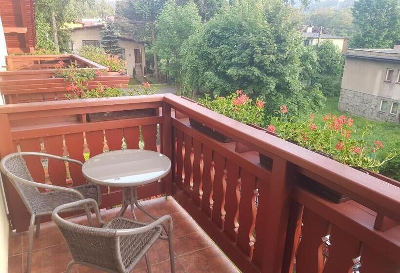 تختخواب و صبحانه U Andzi