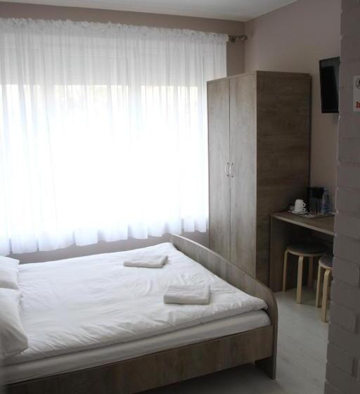 تختخواب و صبحانه M&m Spanie