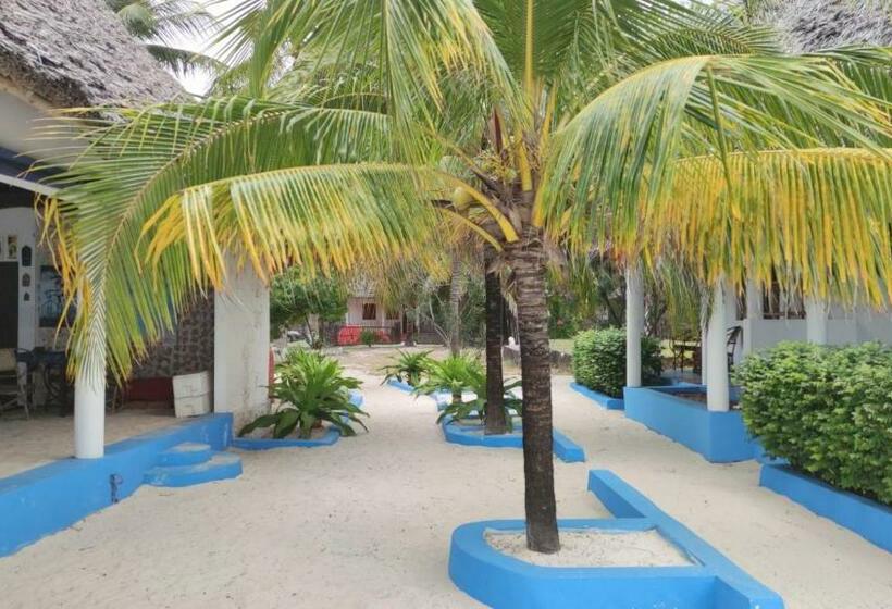 בית מלון כפרי Oasis Beach Inn