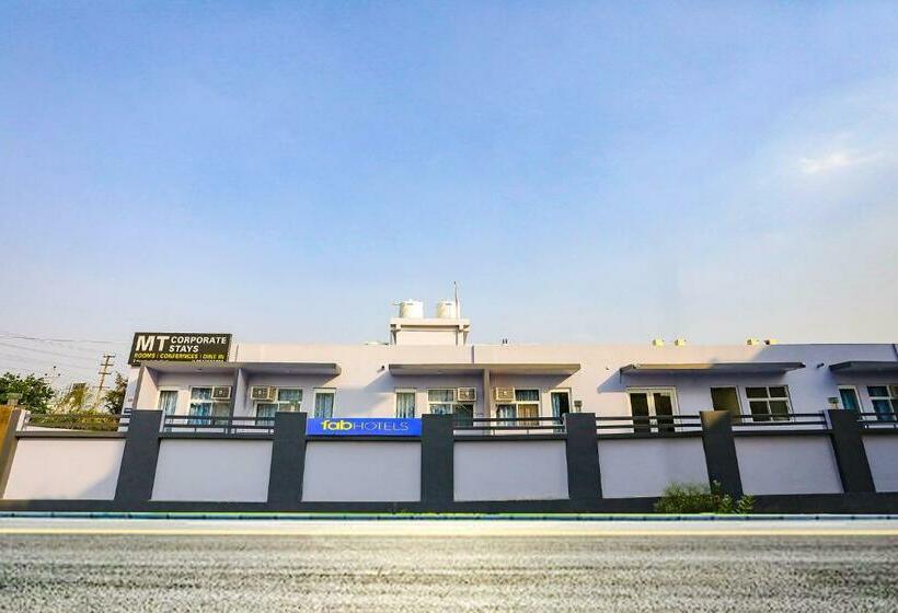 Отель Fabexpress Mt Comfortable Stays