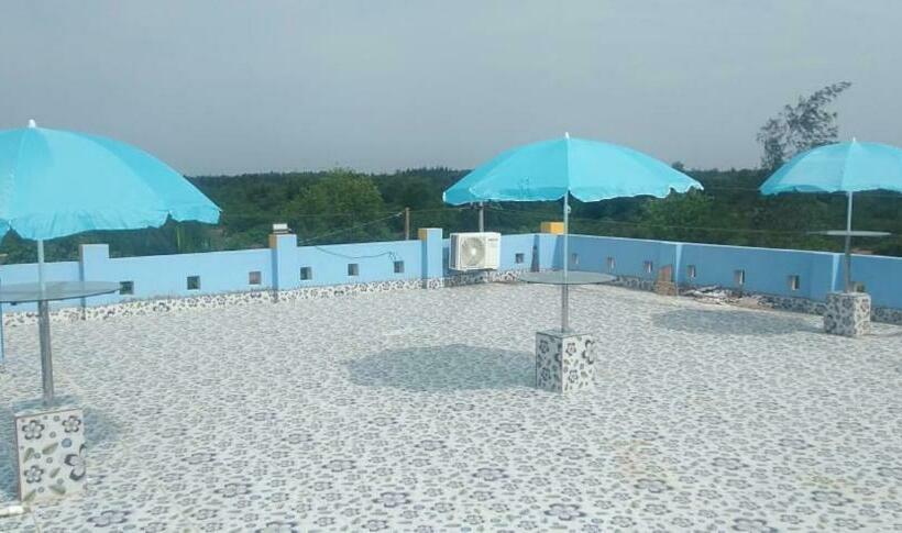 住宿加早餐  Mishra Greens And Farmhouse