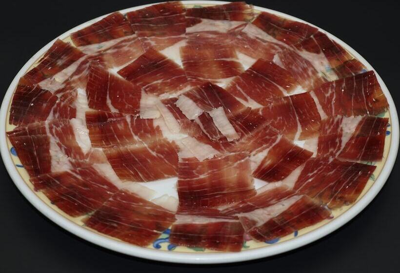 هتل Hostal Restaurante El Paisano