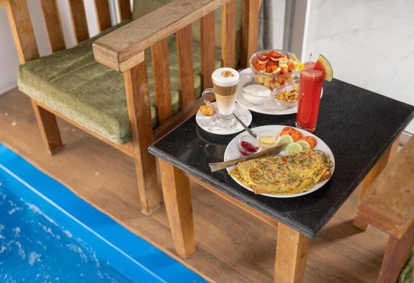 בית מלון כפרי Crystall Goa Turquoise Edition