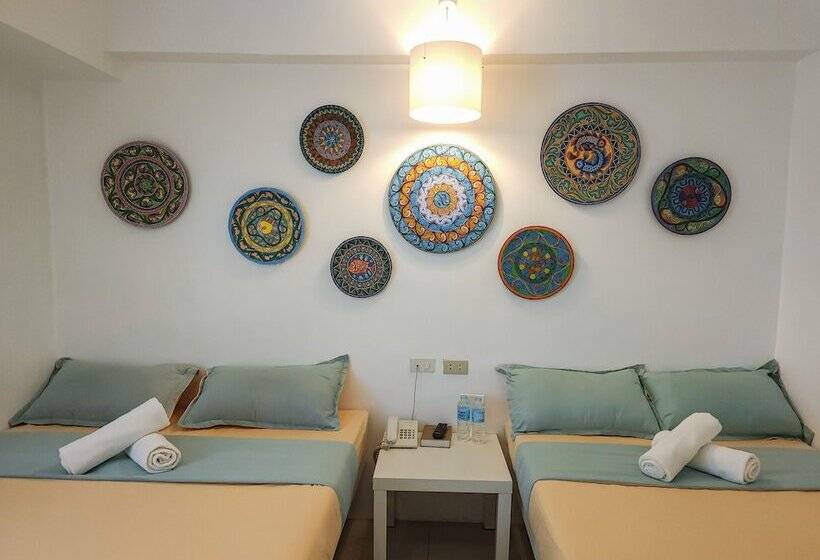 호스텔 Wanderlust Bed And Breakfast Puerto Princesa