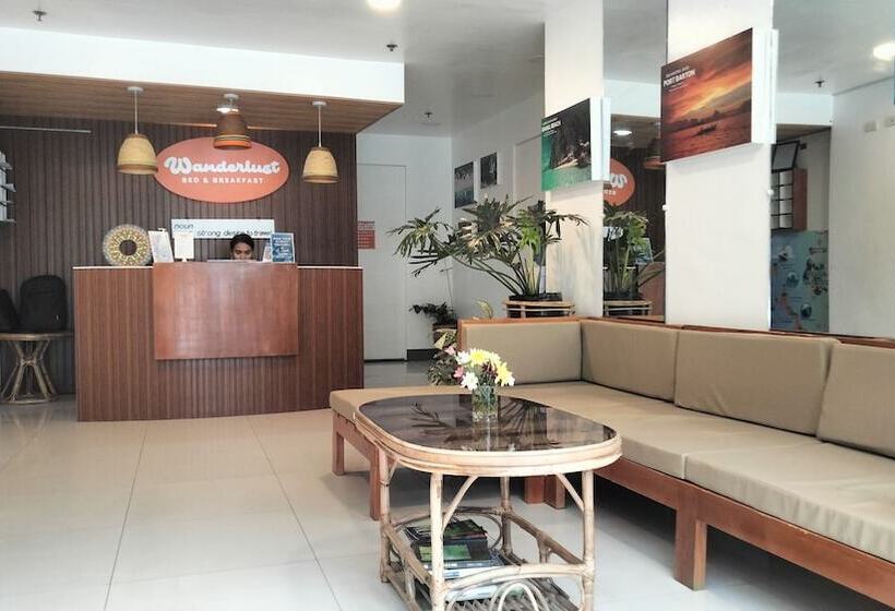 호스텔 Wanderlust Bed And Breakfast Puerto Princesa