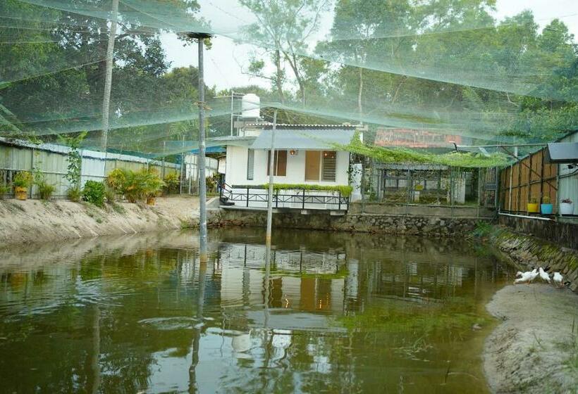 酒店 Marari Farm Heritage Inn