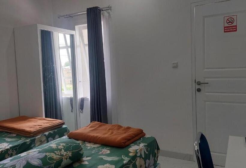 מוטל Wisma Mangurna