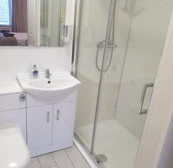 פנסיון The Coastal Inn Outbuilding