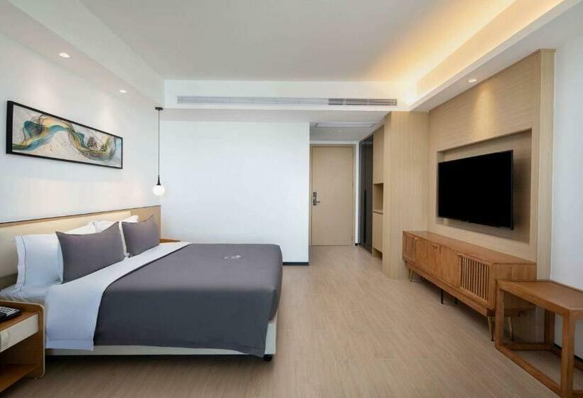 בית מלון כפרי Ramada Encore By Wyndham Jiusuo Downtown