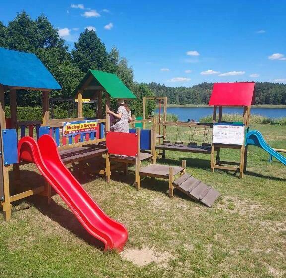 Отель Leśny Dworek Pokoje Nad Jeziorem