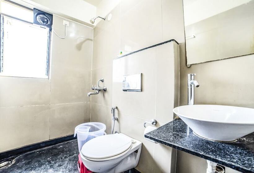 בית מלון כפרי Treebo Blossom   Viman Nagar