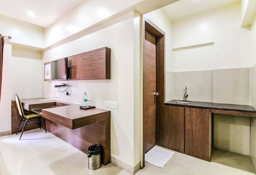 בית מלון כפרי Treebo Blossom   Viman Nagar