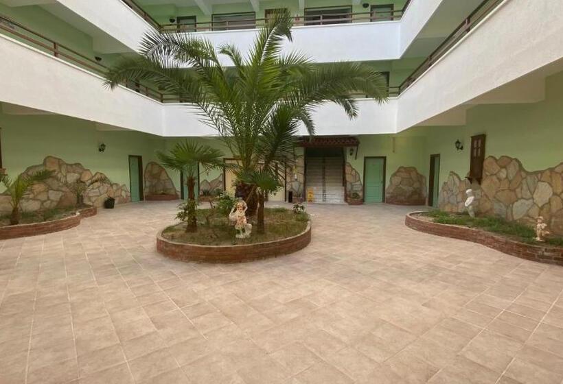 Отель Oya Family Suites