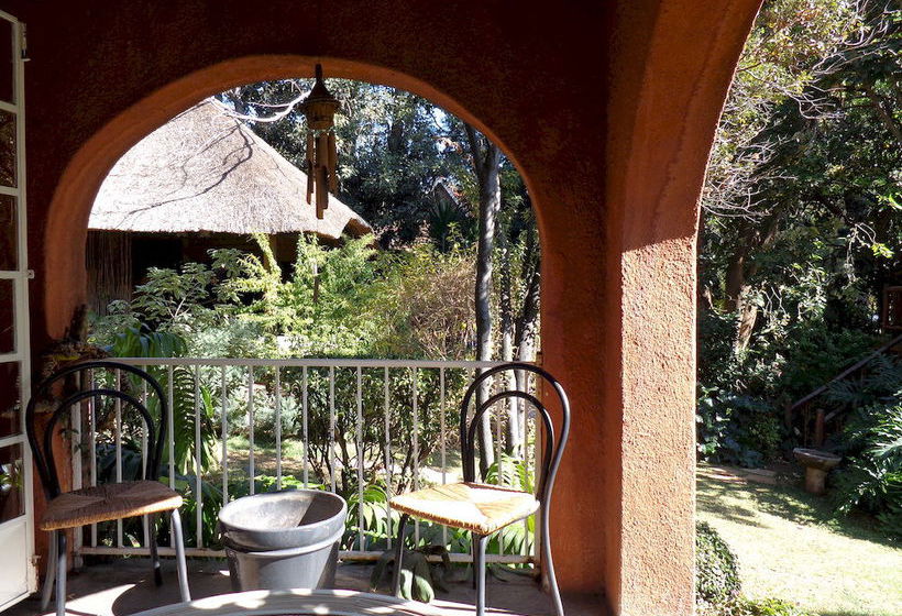 ペンション Treetops & Treats Guest House