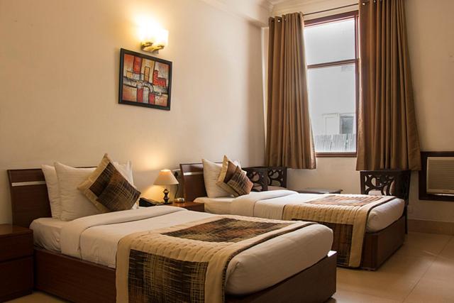 Отель Tavisha Villa