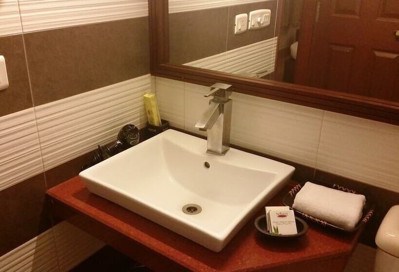 Отель Tavisha Villa