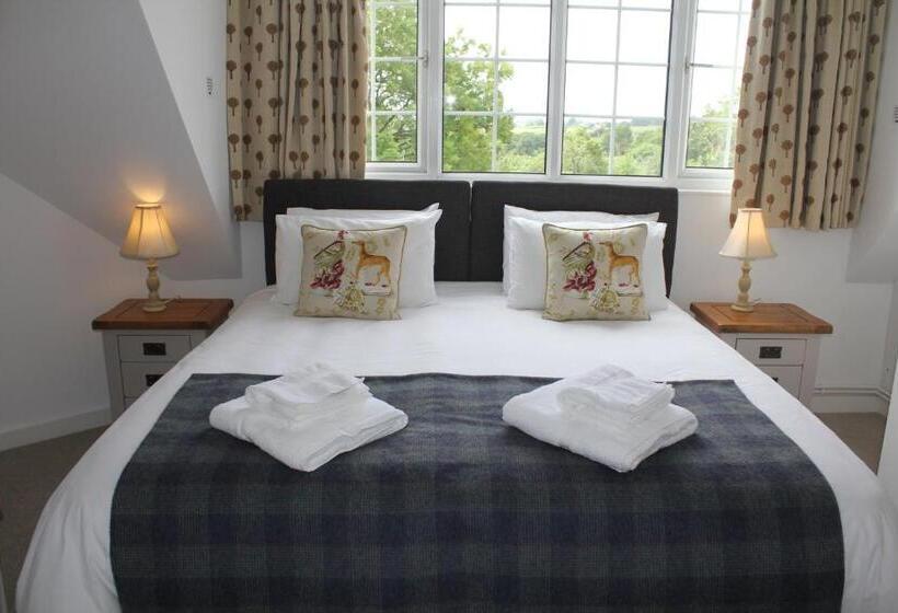 호텔 Three Horseshoes Country Inn