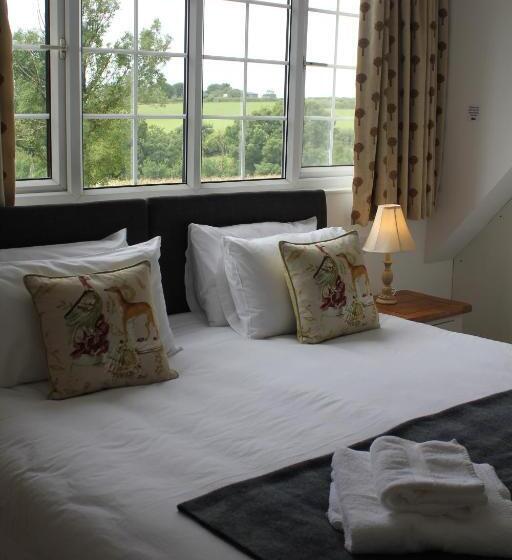 호텔 Three Horseshoes Country Inn