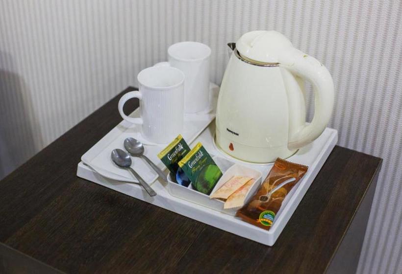 فندق Cosmos Business