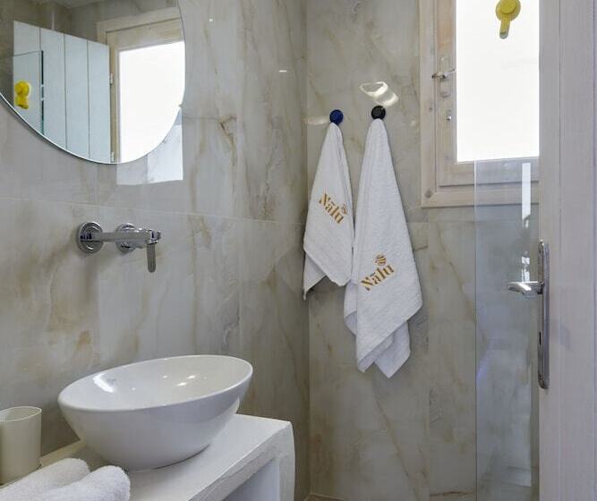 Отель Nalu Suites